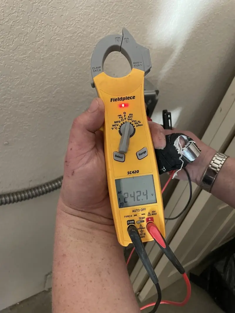 Voltage testing with clamp meter during Circuit Breaker Repair in Mount Pleasant